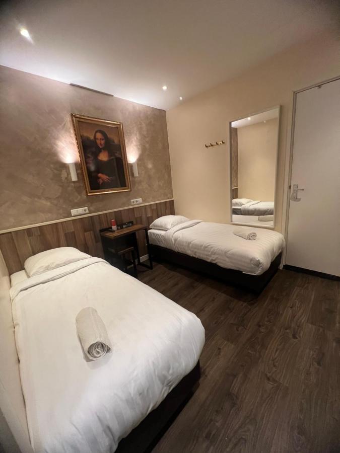 Dam Hotel Amsterdam Esterno foto