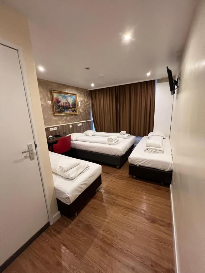 Dam Hotel Amsterdam Esterno foto