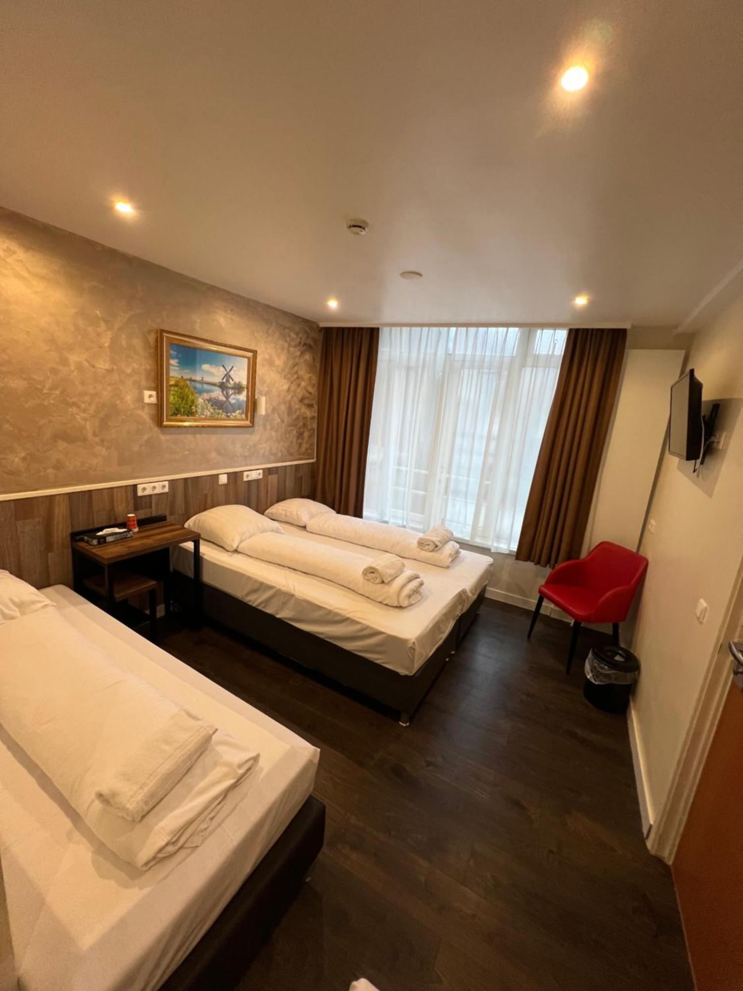 Dam Hotel Amsterdam Esterno foto